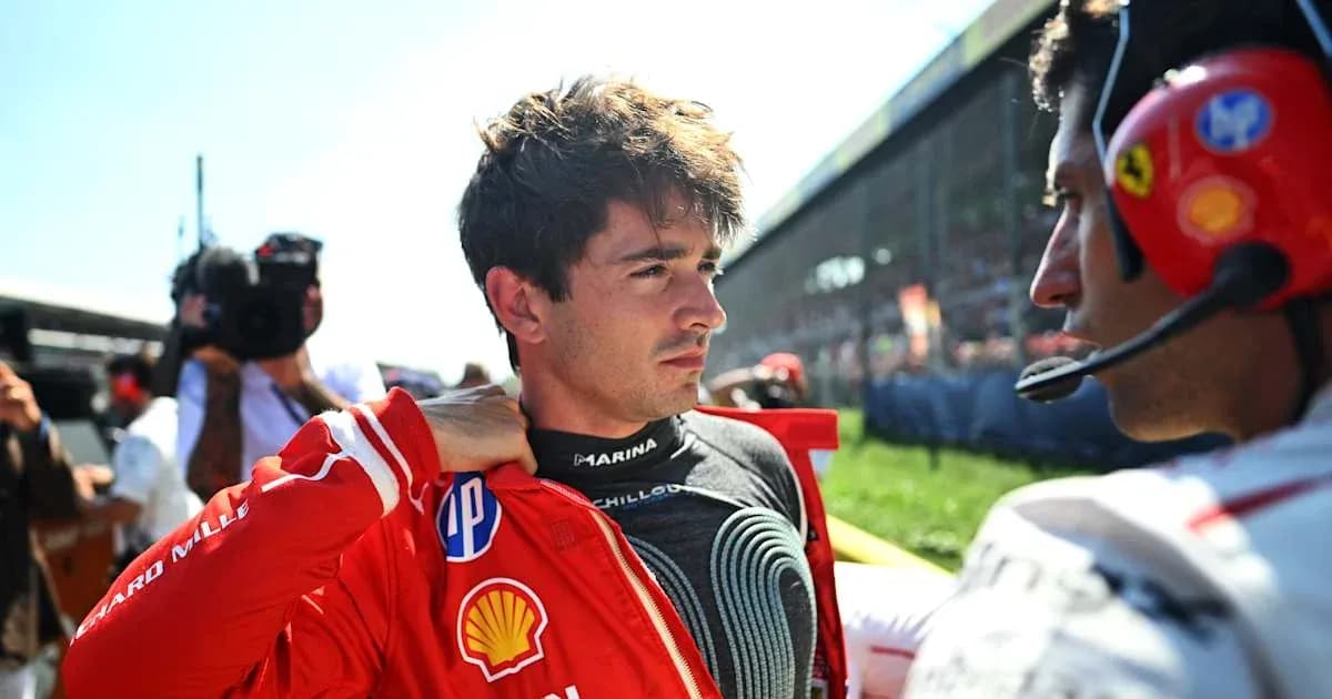 Pilote ajustant sa combinaison avant la course