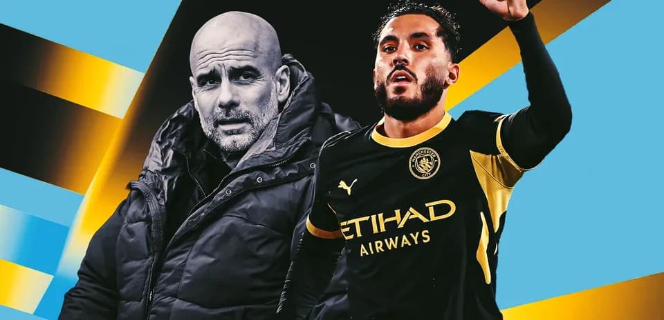 Entraîneur et joueur de Manchester City célébrant