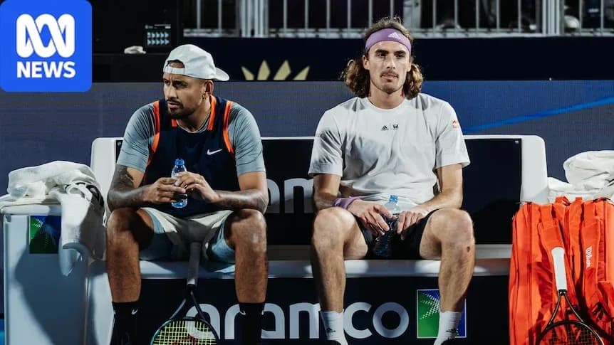 Deux joueurs de tennis assis sur un banc