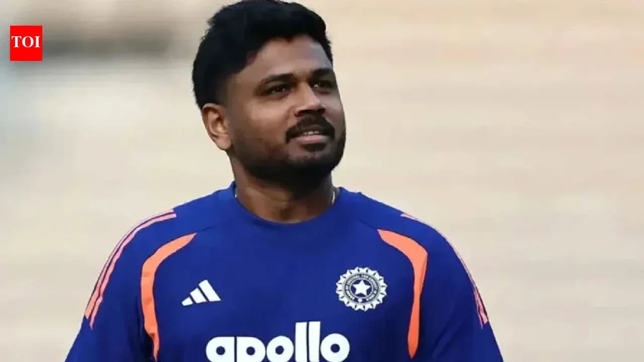 Joueur de cricket en maillot bleu sur le terrain