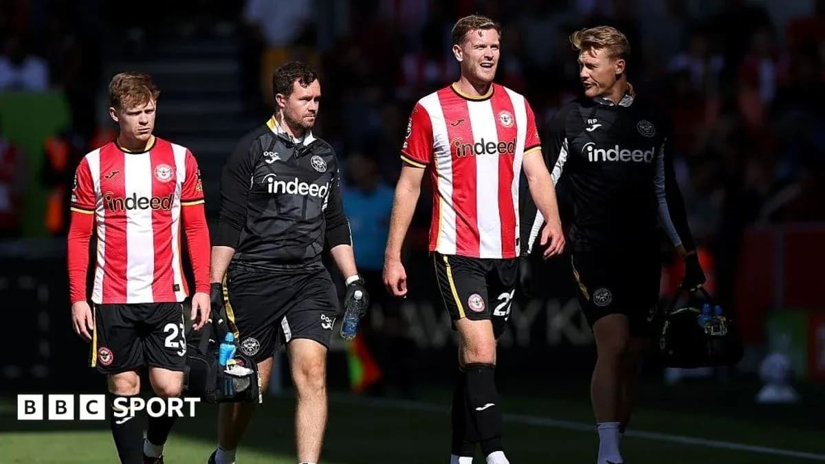 Joueurs de Brentford quittant le terrain après le match