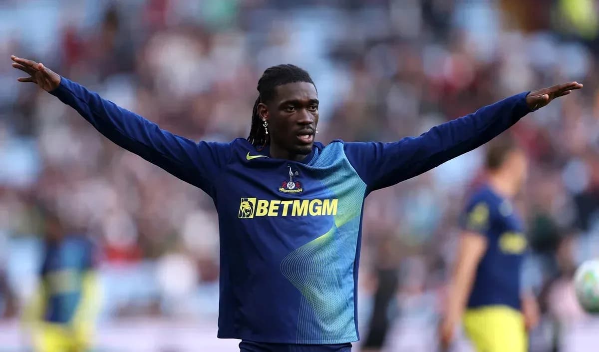 Joueur s'échauffant avant le match au stade