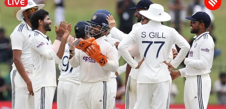 Équipe indienne célébrant une prise en cricket