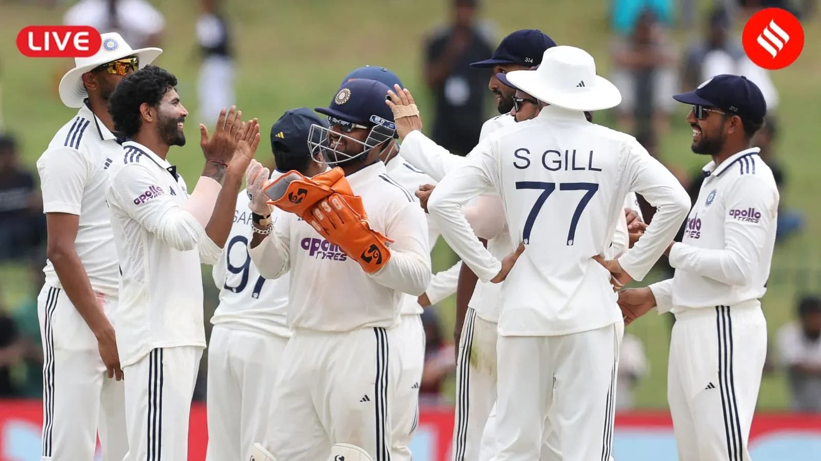 Équipe indienne célébrant une prise en cricket