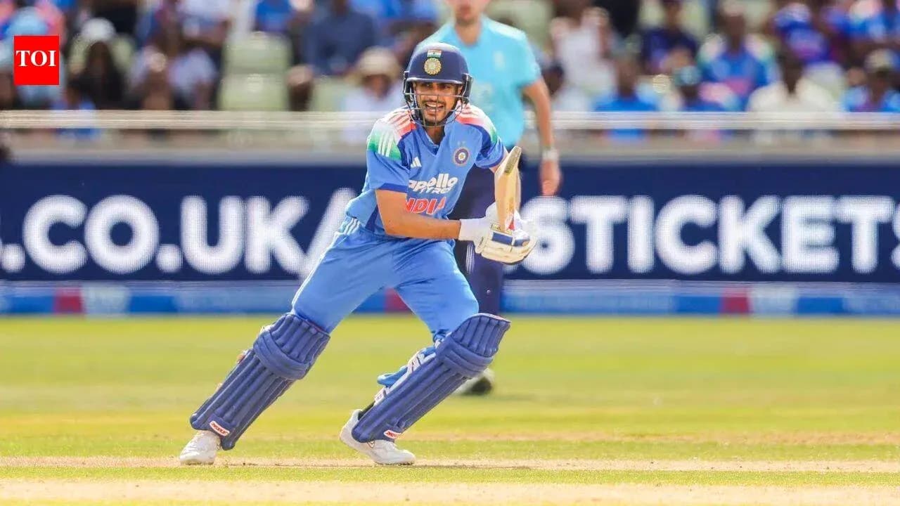 Batsman preparing to play a shot in cricket match