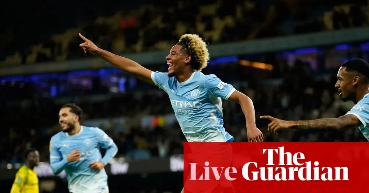 Joueur de Manchester City célébrant un but au stade