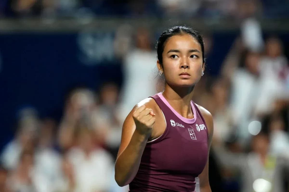 Joueuse de tennis célébrant un point gagné