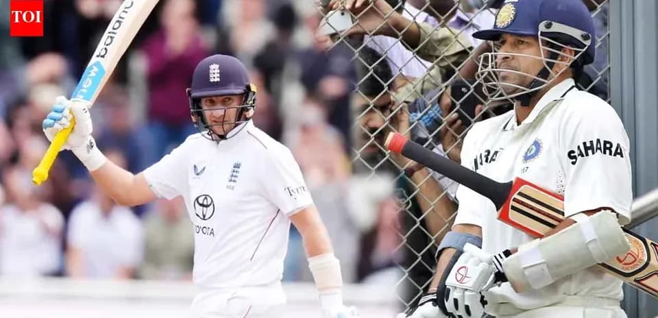 Batsman celebrating while another player waits to bat