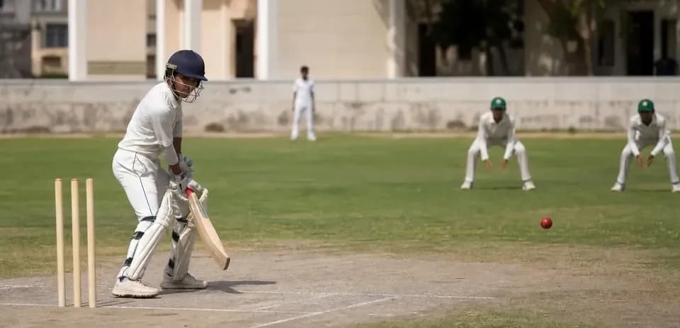 Batteur en action pendant un match de cricket