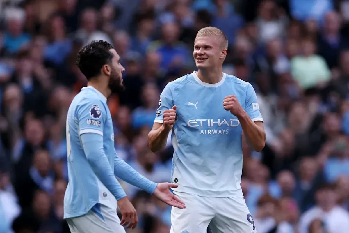 Joueurs de Manchester City célébrant un but