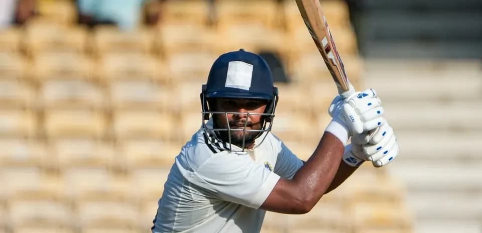 Batsman preparing to hit ball during cricket match