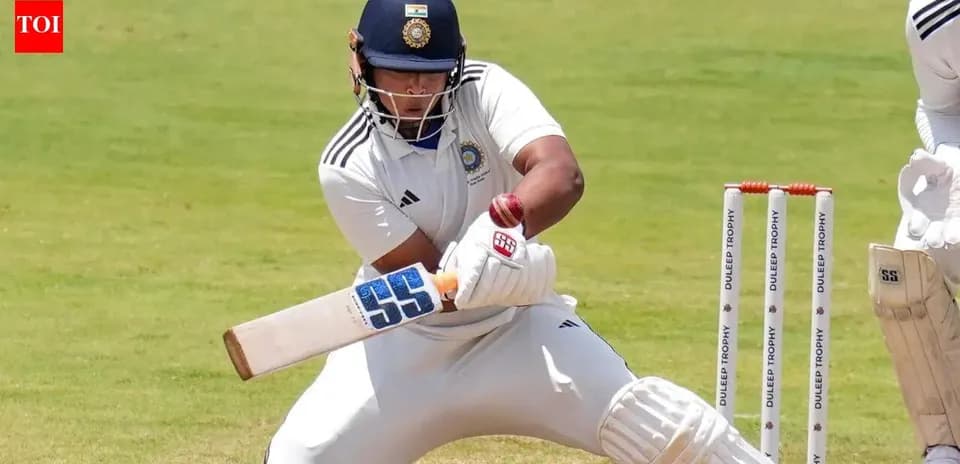 Batsman playing a shot in cricket match