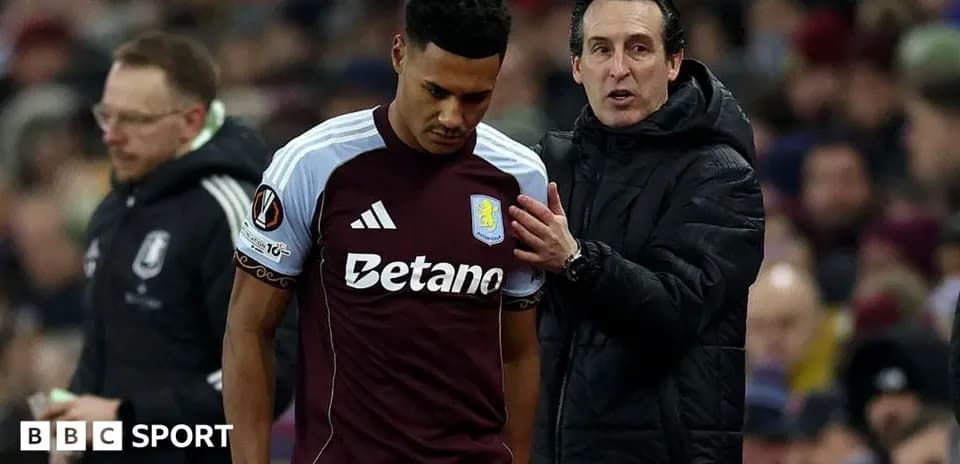 Entraîneur parlant à un joueur d'Aston Villa