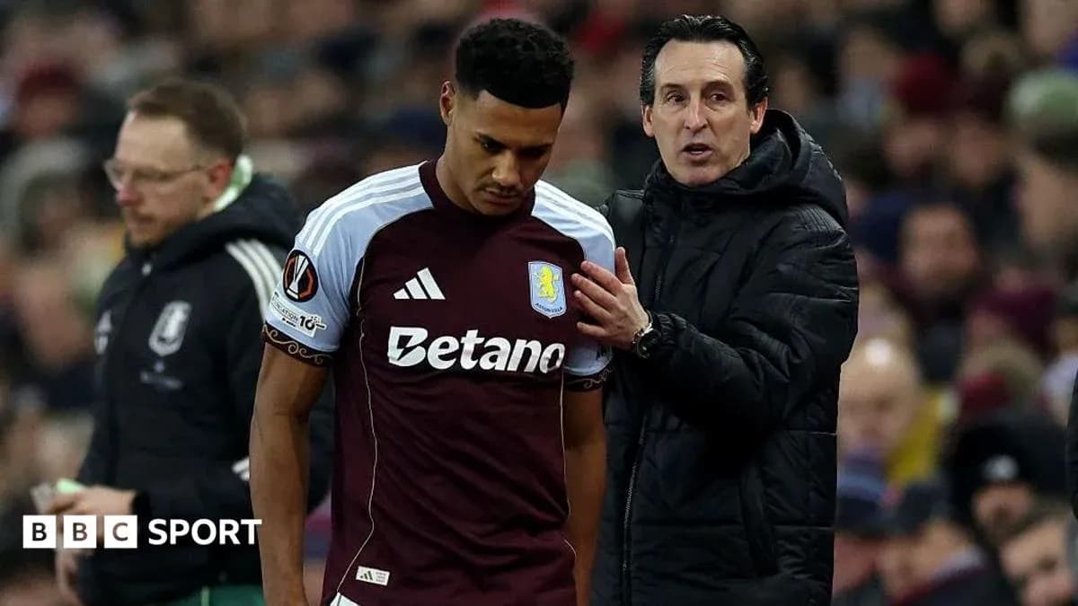 Entraîneur parlant à un joueur d'Aston Villa