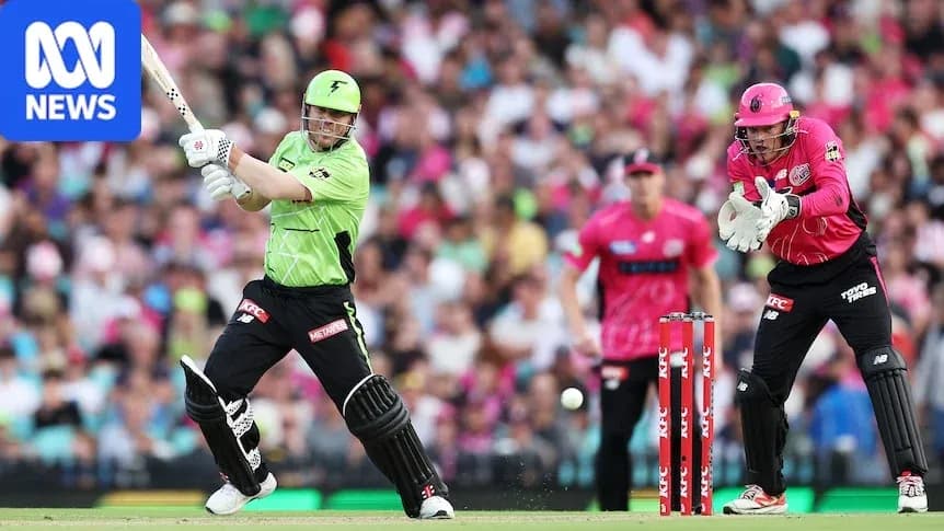 Batteur frappant la balle pendant un match de cricket