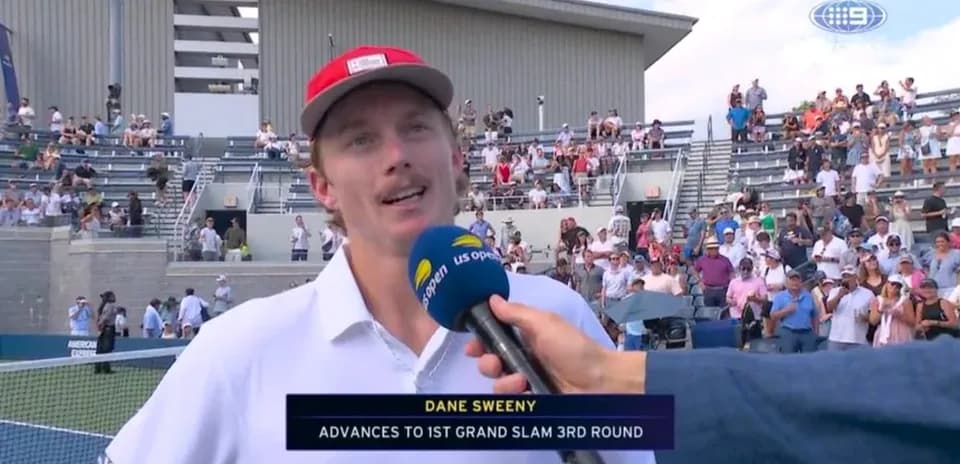 Dane Sweeny interviewed after winning tennis match