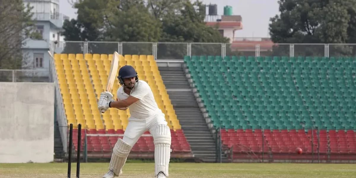 Joueur de cricket prêt à frapper la balle