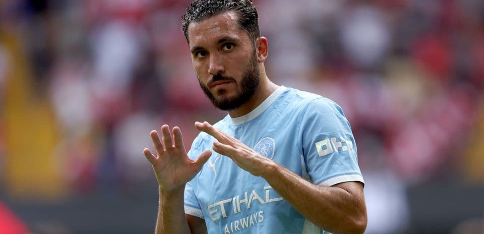 Joueur de Manchester City saluant le public au stade