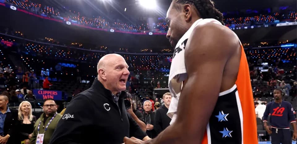 Steve Ballmer congratulating Kawhi Leonard after game