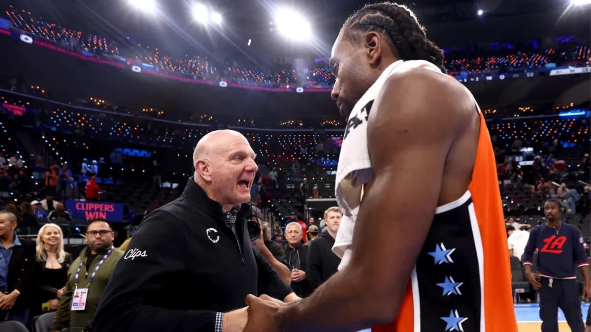 Steve Ballmer congratulating Kawhi Leonard after game
