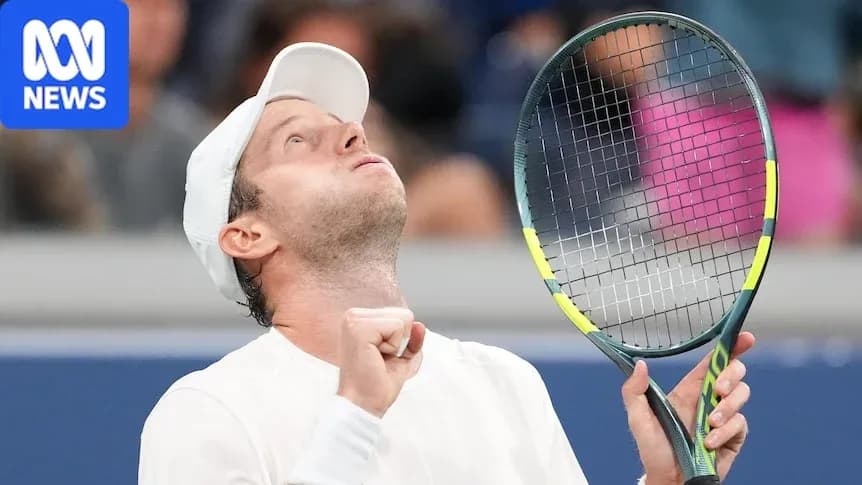 Joueur de tennis célébrant un point au match