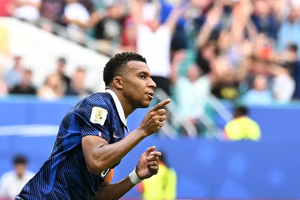 Kylian Mbappé célébrant un but lors d'un match