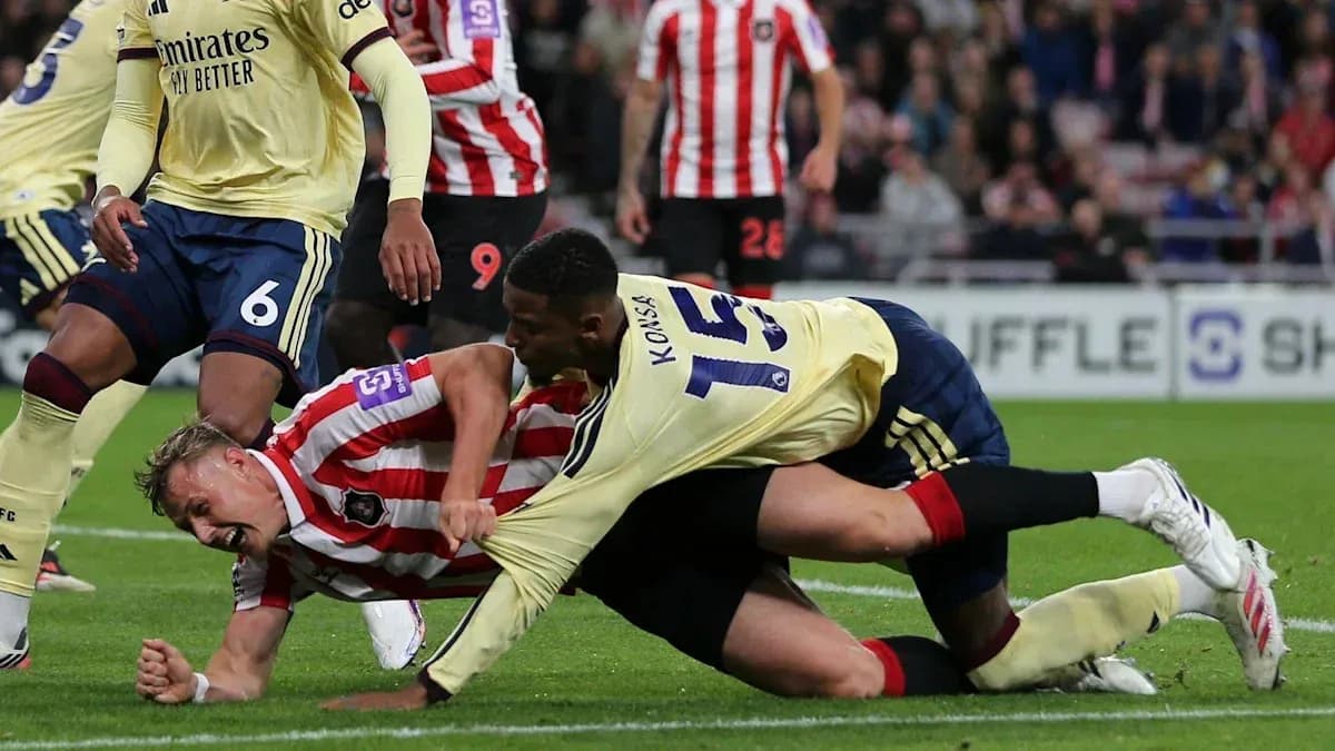 Joueurs au sol lors d'un match de football