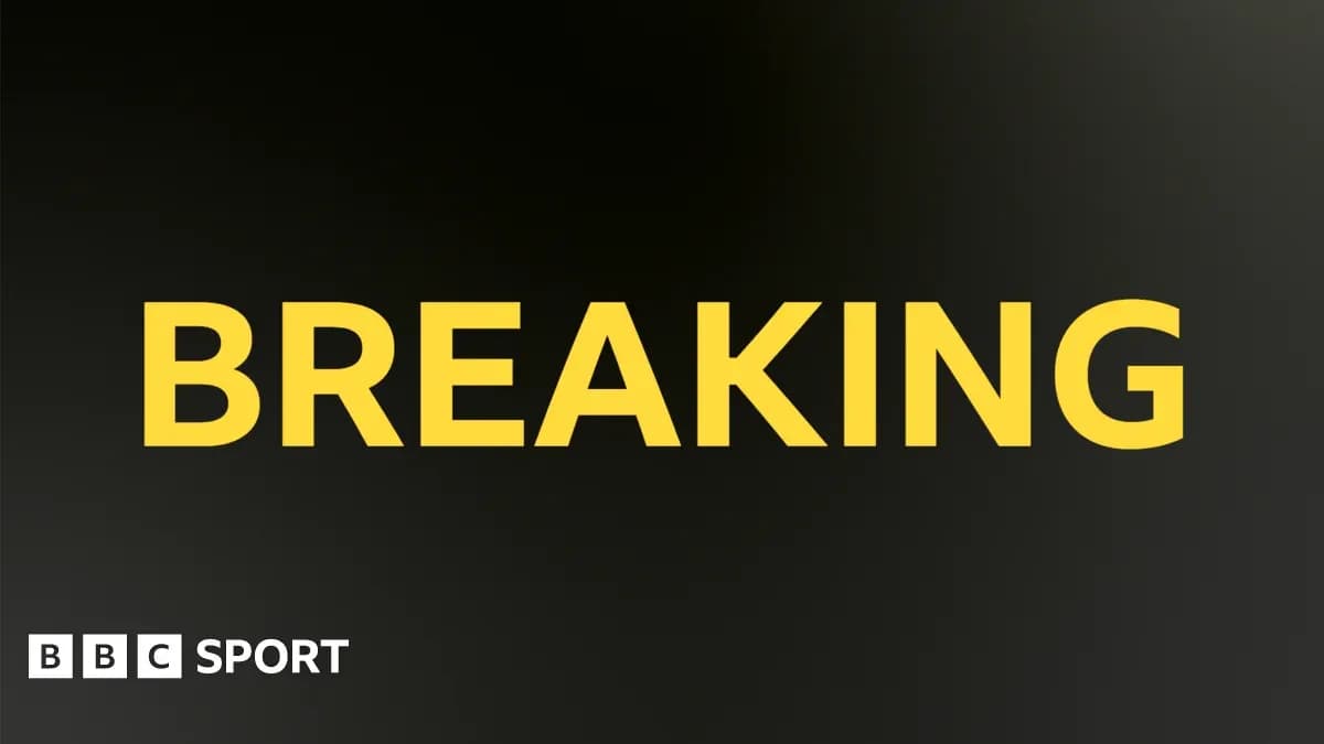 Texte 'BREAKING' sur fond noir