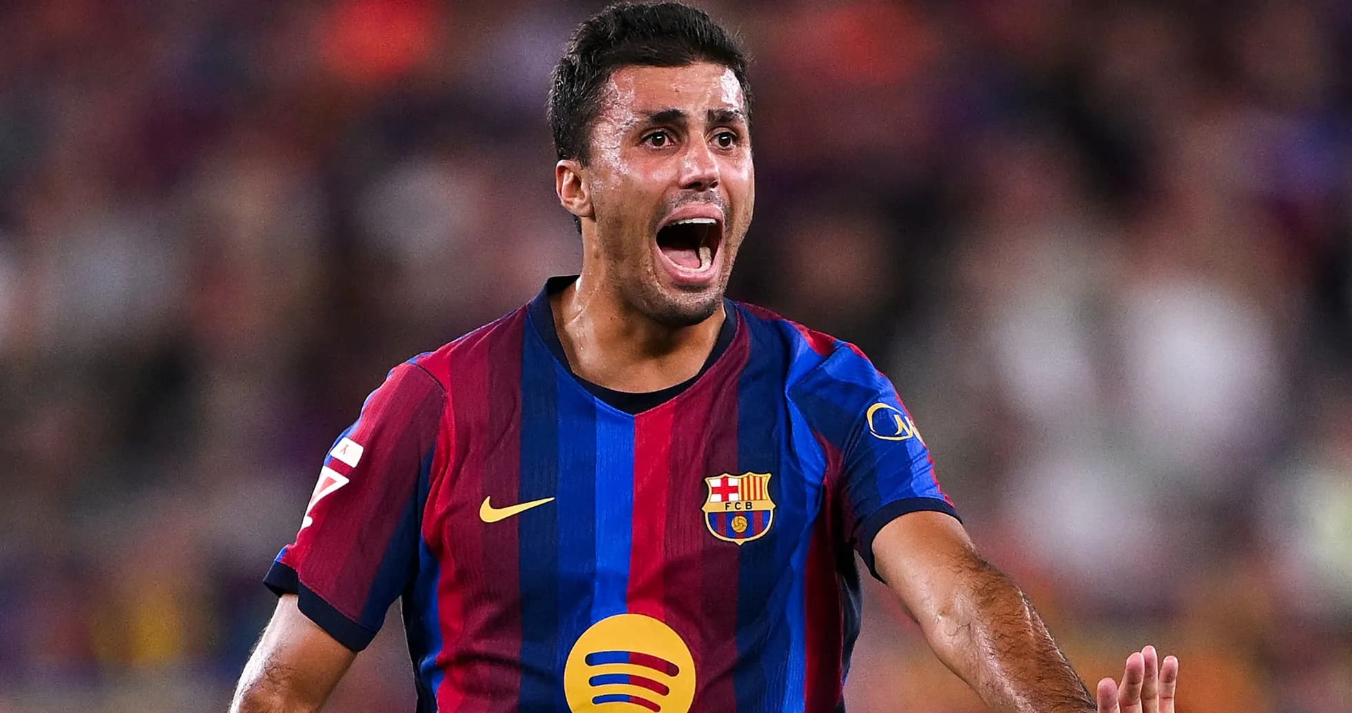 Joueur de Barcelone célébrant une action sur le terrain