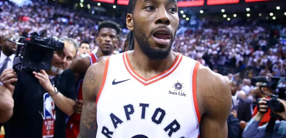 Kawhi Leonard exiting court after playoff victory