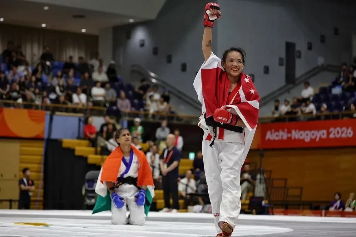 Athlete celebrating victory in martial arts competition