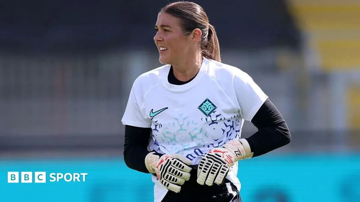 Gardienne de but en entraînement avec gants