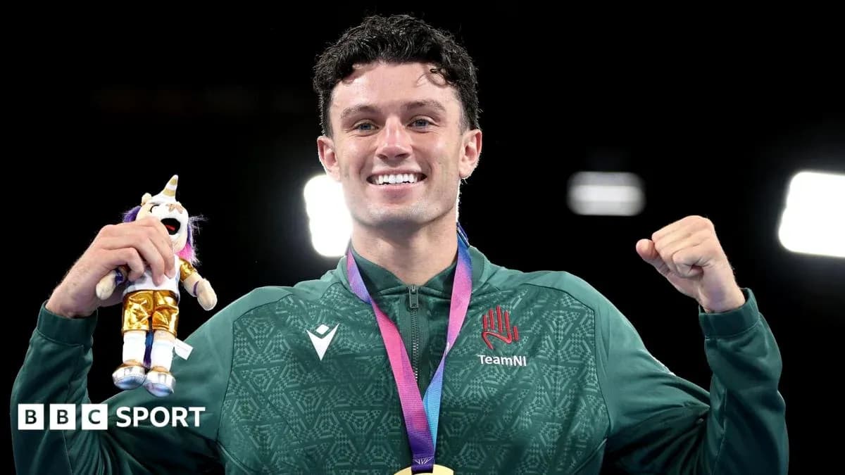 Athlete celebrating with medal and plush toy