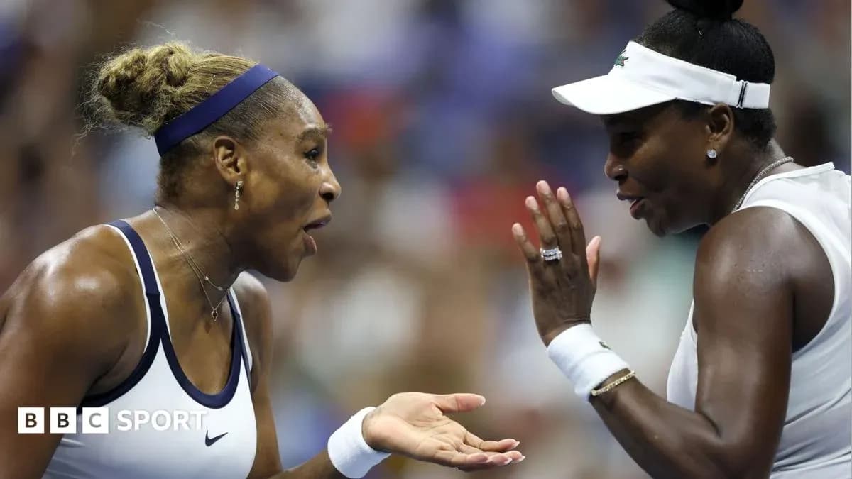 Serena et Venus Williams discutant pendant un match