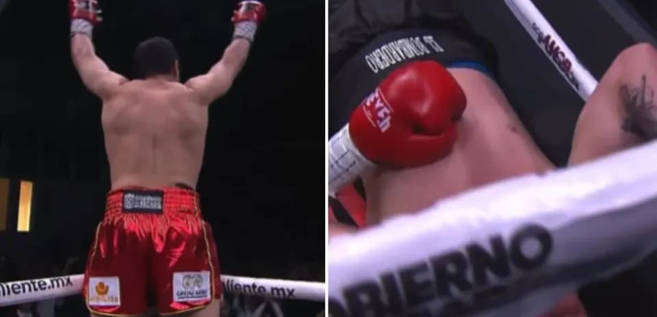 Boxeur victorieux célébrant avec bras levés