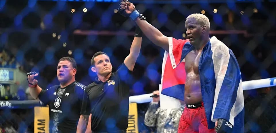 Fighter celebrating victory with flag after match