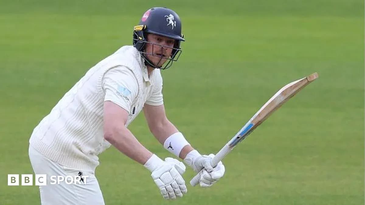 Joueur de cricket en action avec une batte