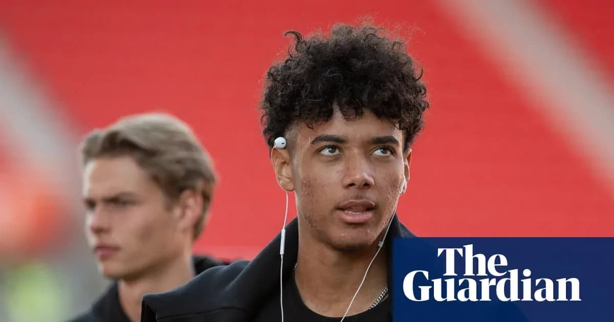Jeune joueur portant des écouteurs avant le match