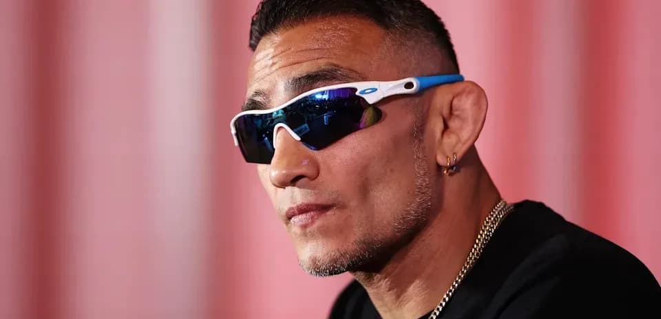 Athlete wearing sunglasses during press conference