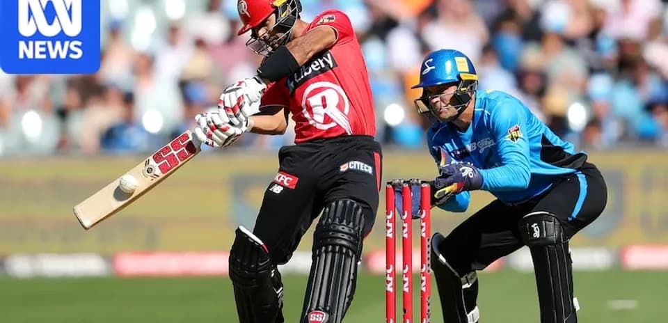 Batter playing a shot with wicketkeeper crouched