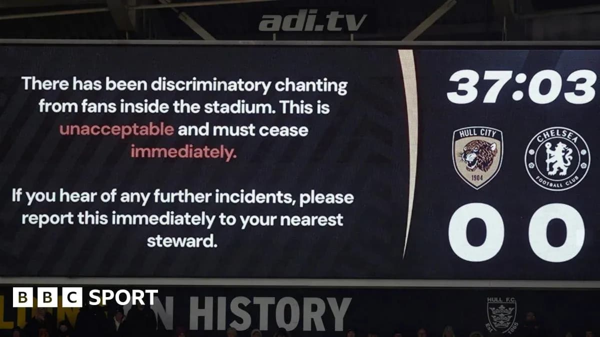 Stadium screen displaying warning about discriminatory chanting Stadium screen displaying warning about discriminatory chanting