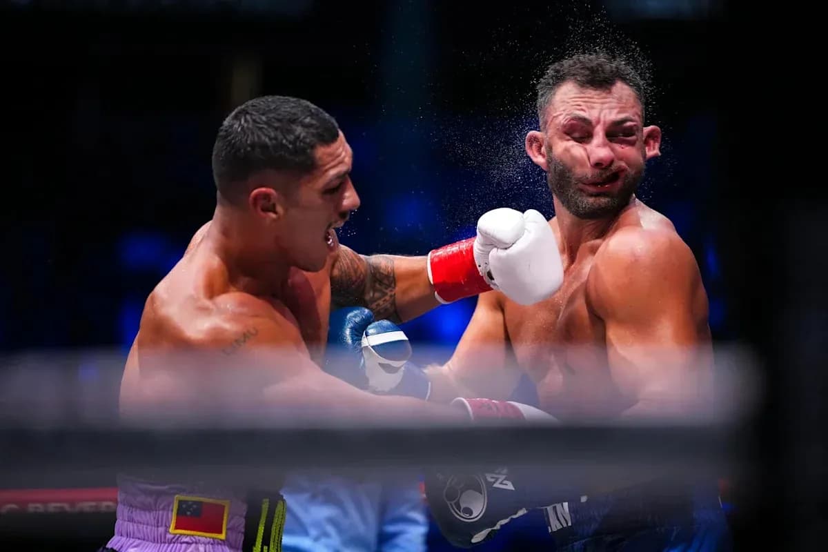Boxers exchanging punches in the ring Boxers exchanging punches in the ring