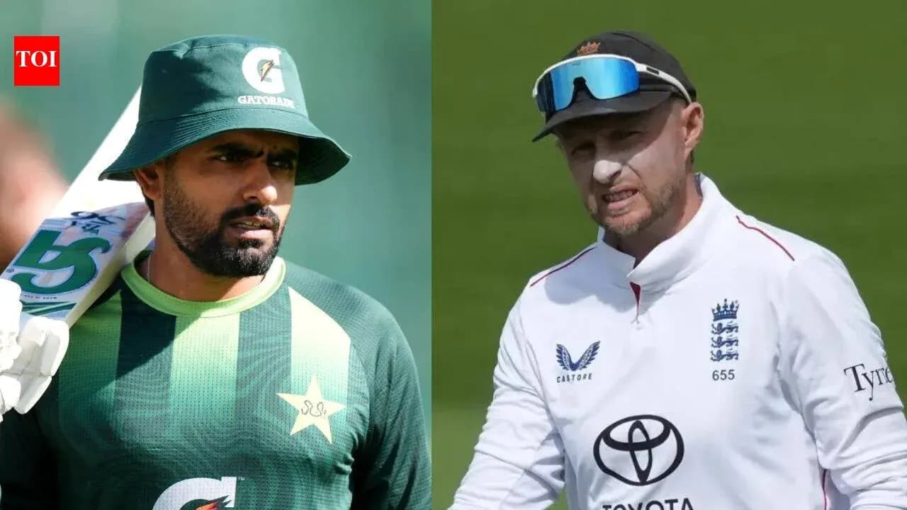 Babar Azam and Joe Root during cricket match Babar Azam and Joe Root during cricket match