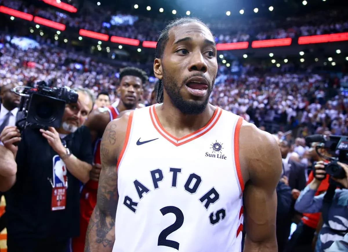 Kawhi Leonard exiting court after playoff victory Kawhi Leonard exiting court after playoff victory