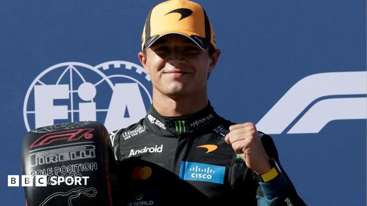 Pilote célébrant sa pole position avec un pneu Pilote célébrant sa pole position avec un pneu