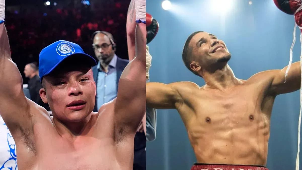 Deux boxeurs levant les bras après un match Deux boxeurs levant les bras après un match