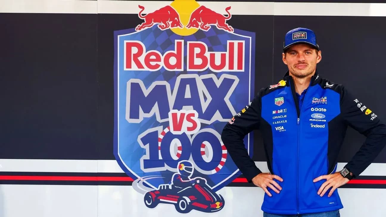 Pilote posant devant le logo Red Bull MAX vs 100 Pilote posant devant le logo Red Bull MAX vs 100