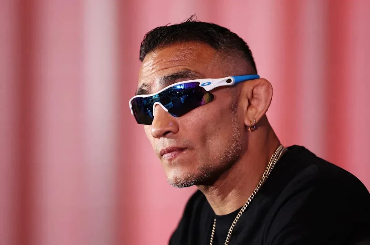 Athlete wearing sunglasses during press conference Athlete wearing sunglasses during press conference